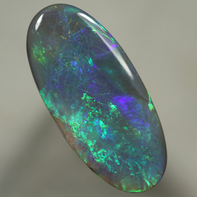 SOLID SEMI BLACK OPAL Large, quality opal with bright rolling flashes. SEE VIDEO